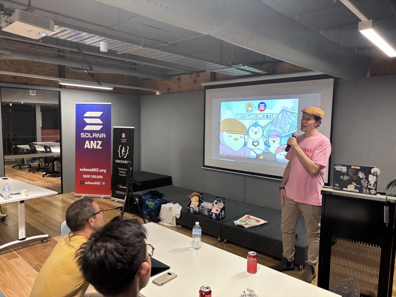Host opening Brisbane Meetup on stage