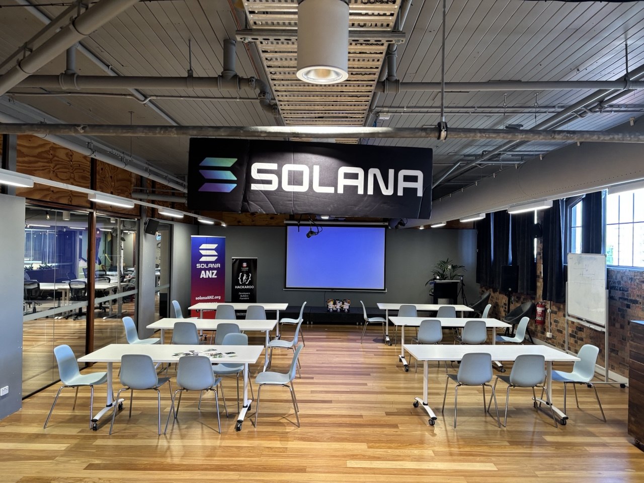 Venue setup under the Solana banner at The Precinct
